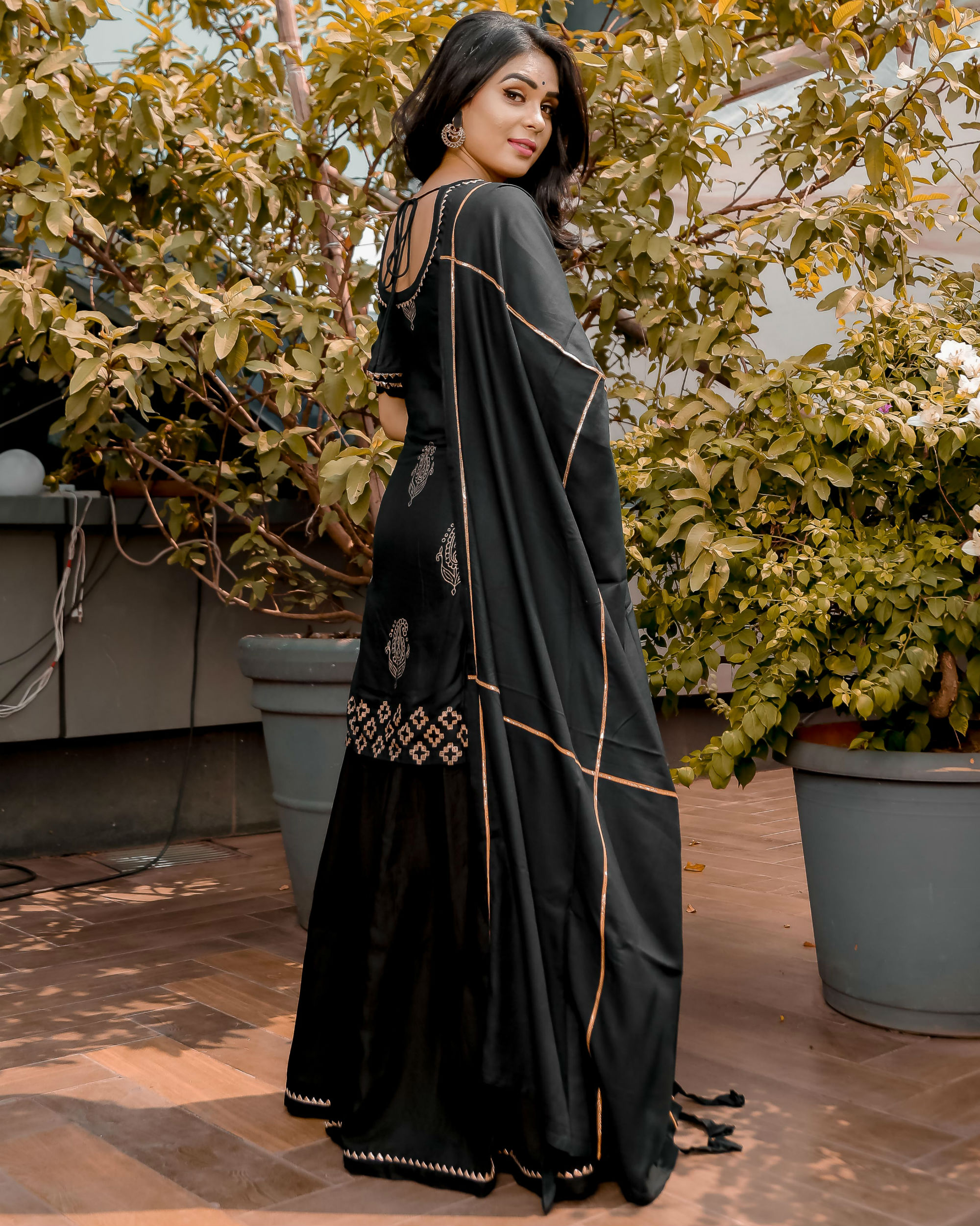 Black golden print sharara set by Aachho | The Secret Label