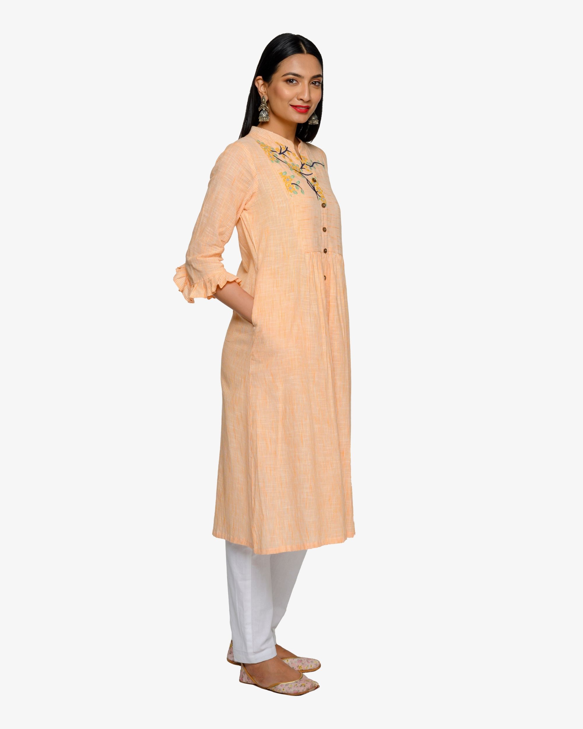 peach and white suit