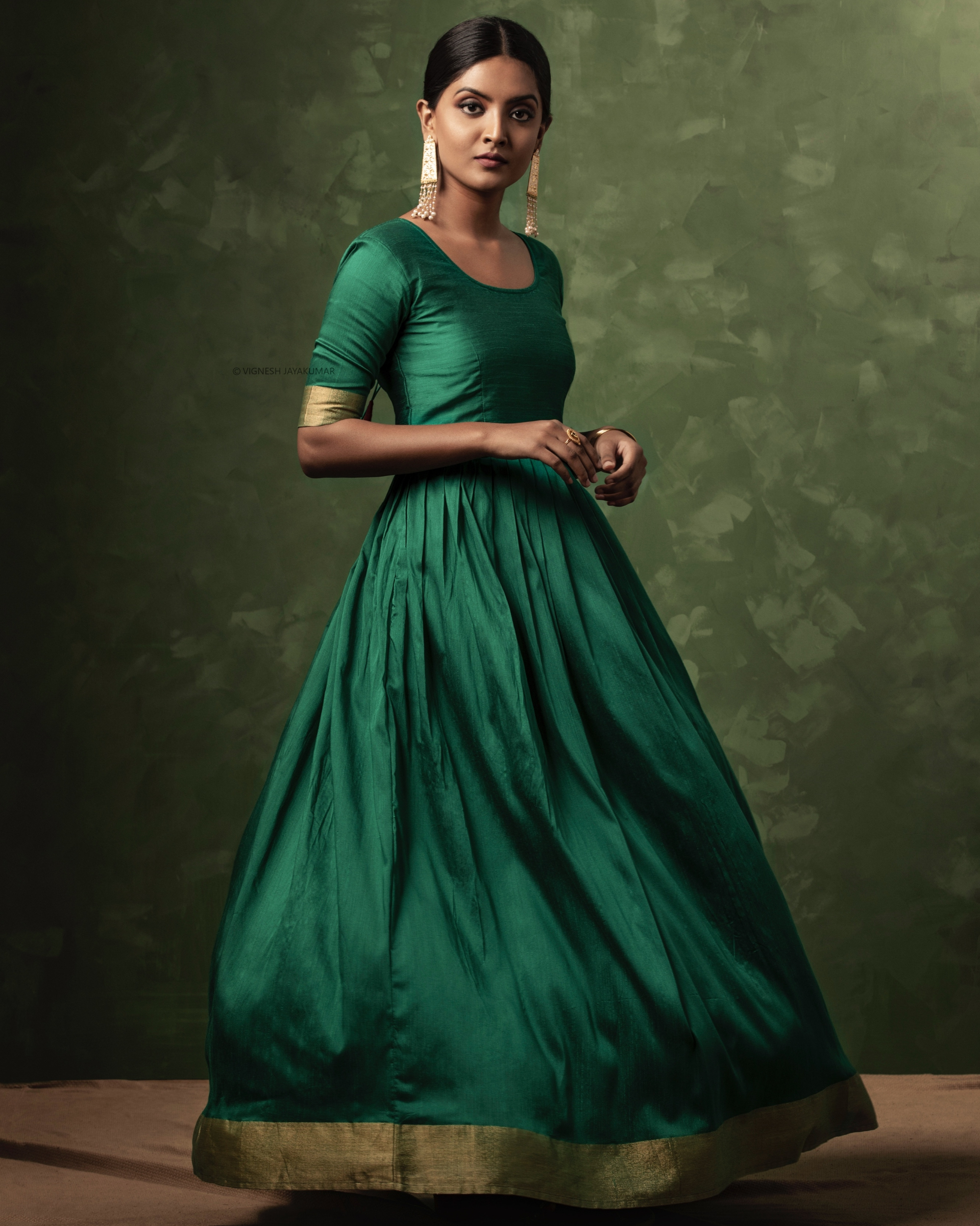 emerald green and gold outfit