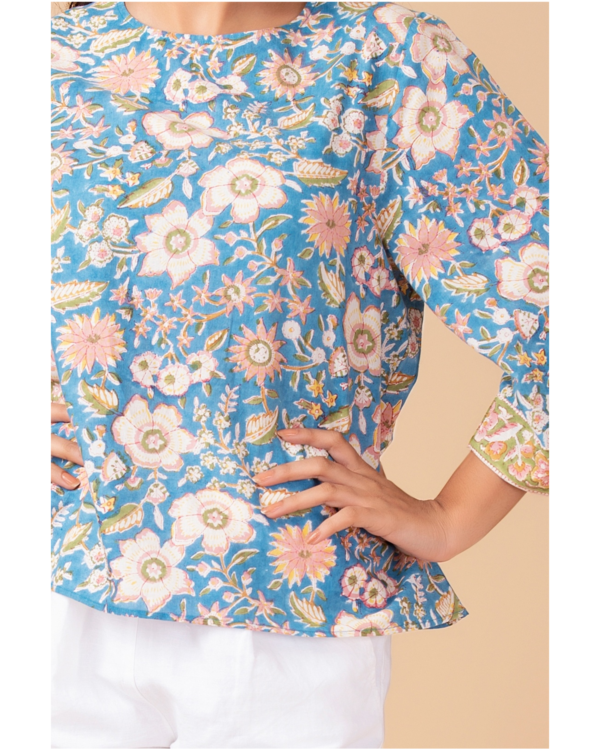 Aqua blue floral printed top by Twirl Studio The Secret Label